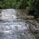 Looking up to the swimming pool from some lower cascades.